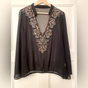 Transparent  blouse with rhinestones